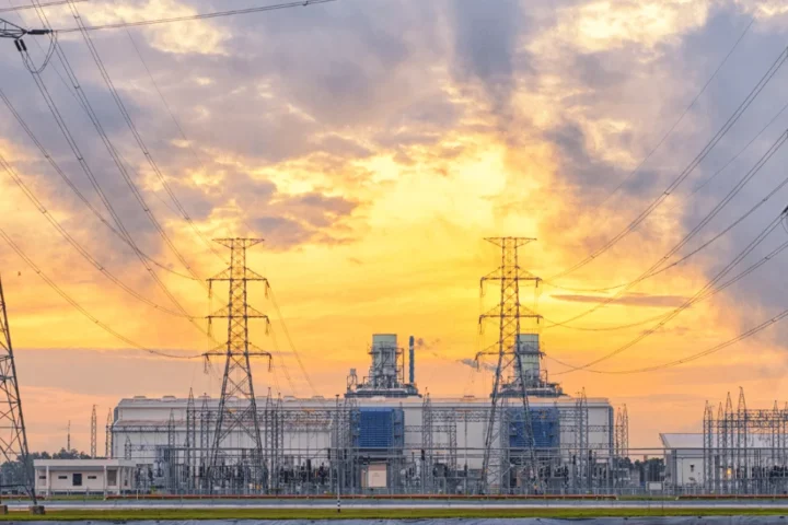 high voltage electricity tower in row