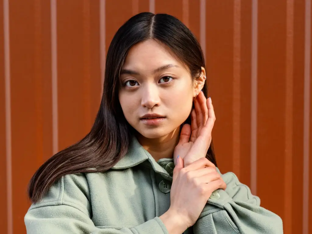 Korean girl showing his glass skin face