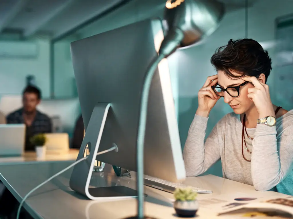 office-headache-woman-with-workplace-burnout-by-ai