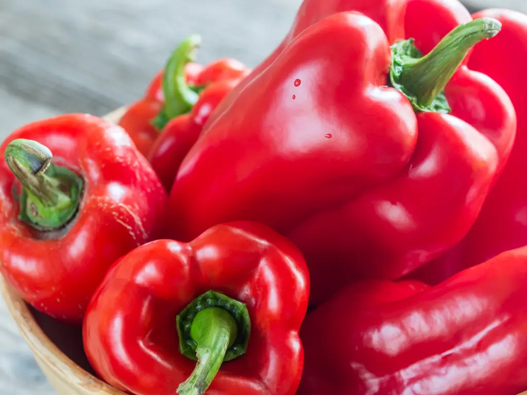 red-bell-peppers on bowl