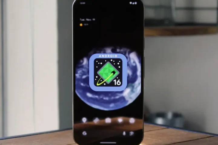 A smartphone displaying the Android 16 Developer Preview home screen with a futuristic app icon and Earth-themed wallpaper